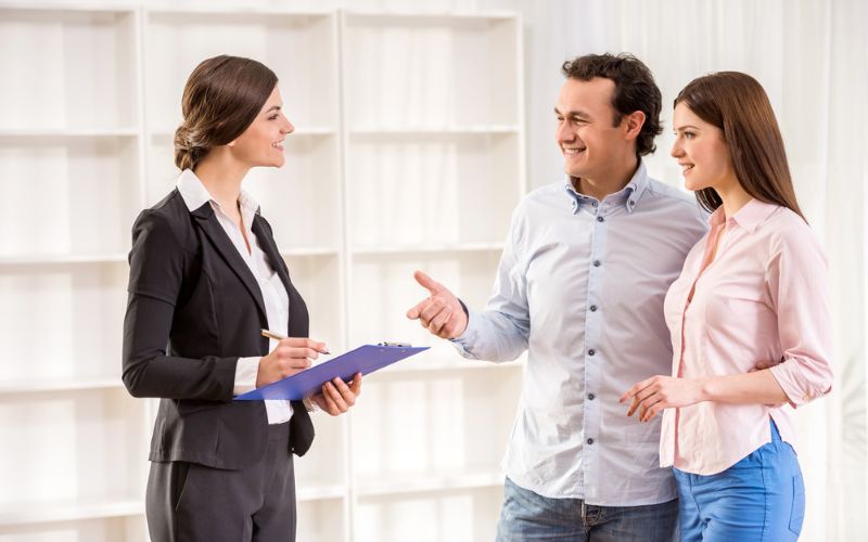 Real estate agent discussing property options with client